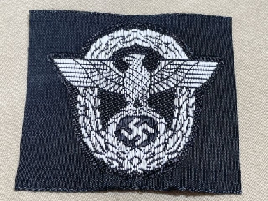 Original WWII German Panzer Police M43/Overseas Cap Insignia