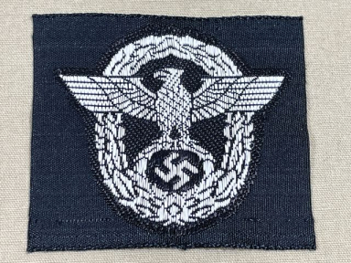 Original WWII German Panzer Police M43/Overseas Cap Insignia