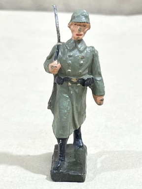 Original Nazi Era German Army Toy Soldier Marching in Greatcoat