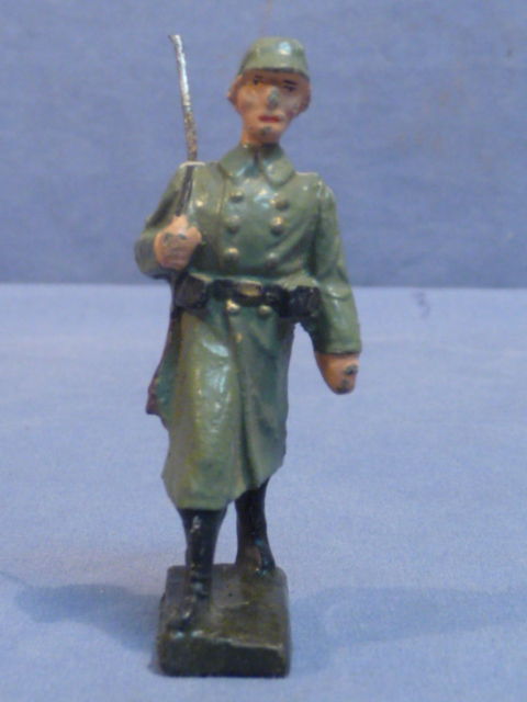 Original Nazi Era German Army Toy Soldier Marching in Greatcoat