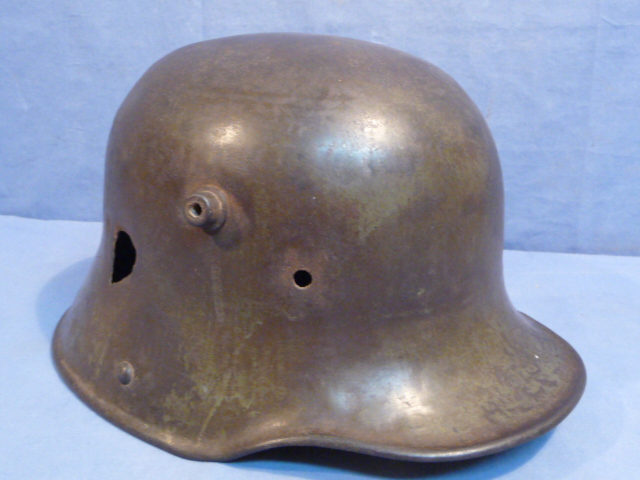 Original WWI German Battle Damaged M16 Helmet