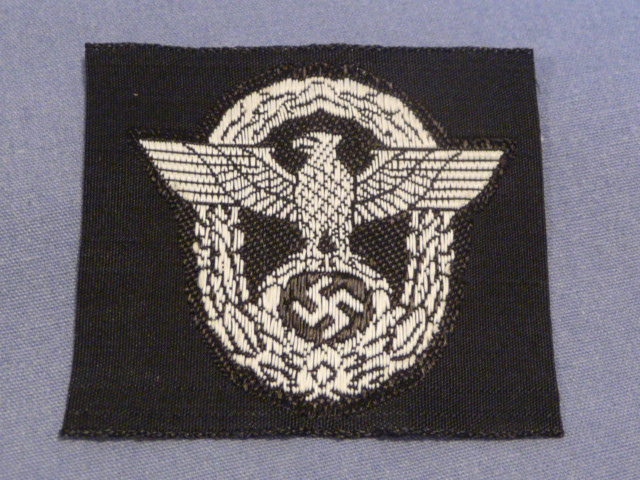 Original WWII German Police M43/Overseas Cap Insignia on Black Backing