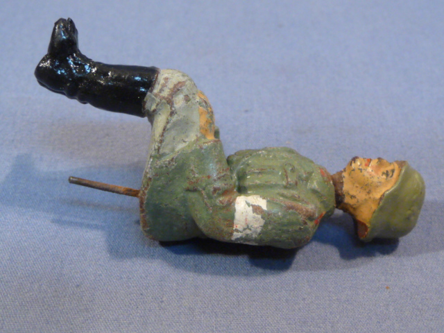 Original Nazi Era German Toy Soldier Sitting with (Partial) Red Cross Armband